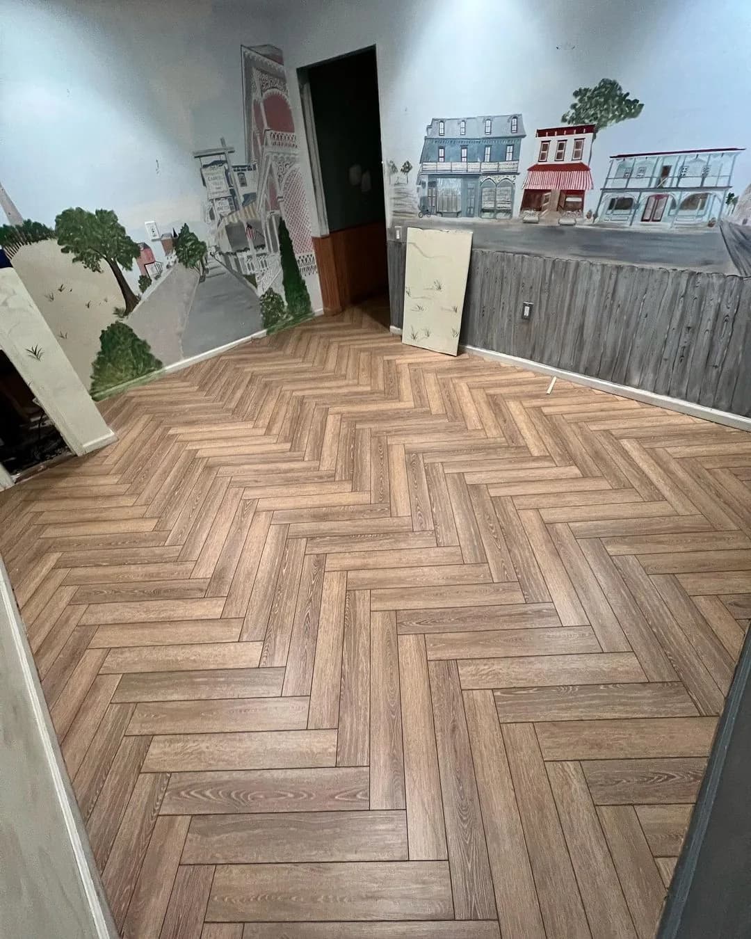 LVP laid in a herringbone pattern across a Houston living room